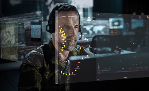 Image of screen and defence operative, using Janes OSINT