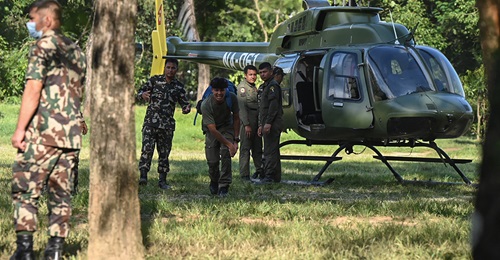 A Nepali Army Bell 407 helicopter during flood-rescue operations at Battar Bazar