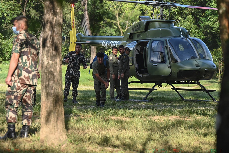 A Nepali Army Bell 407 helicopter during flood-rescue operations at Battar Bazar