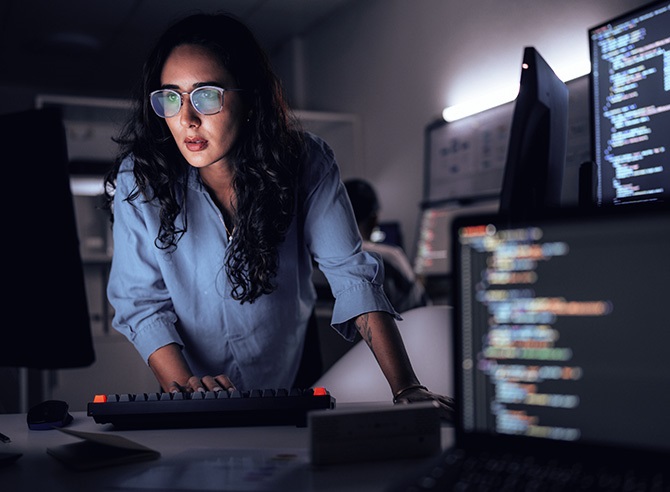 Photo of intelligence operative at workstation using Janes - Links to Defence Budgets, Programmes and Forecasts