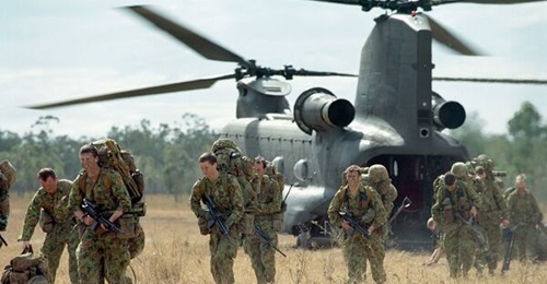 Soldiers from the 1st Battalion, Royal Australian Regiment, are pictured disembarking from a CH-47F Chinook attached to the 5th Aviation Regiment. On 2 December the Australian Army established a new Aviation Command Unit.