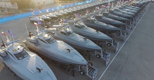 The 12 missile-armed fast attack craft lined up next to each other during the handover ceremony at the IRGC's naval base in Bandar Abbas.