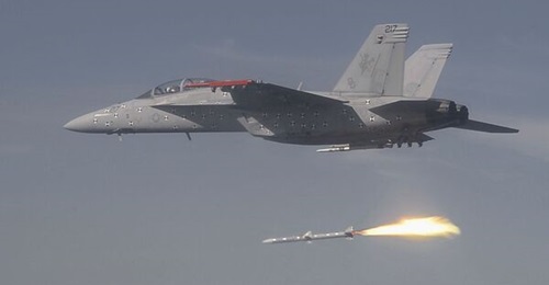 A US Navy F/A-18F Super Hornet multirole combat aircraft testbed conducts a safe separation launch with an AIM-120D-3 AMRAAM variant over Naval Air Station Point Mugu, California on 12 May, 2021.
