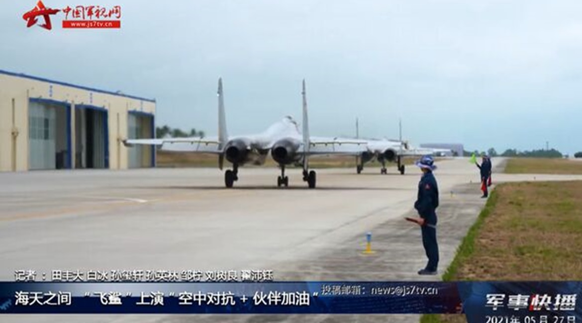 A screengrab from footage released by CCTV on 27 May showing two PLANAF J-15 multirole fighters about to take off from Lingshui Airbase on Hainan Island in the South China Sea.