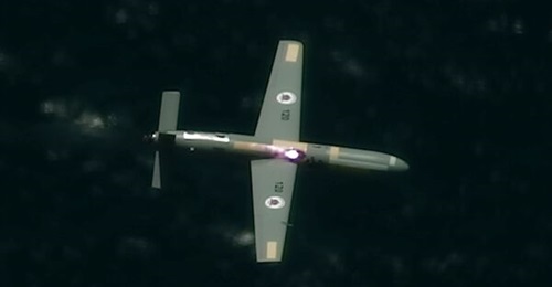 A high-power laser burns through a target drone during a trial of an airborne system announced in June 2021.