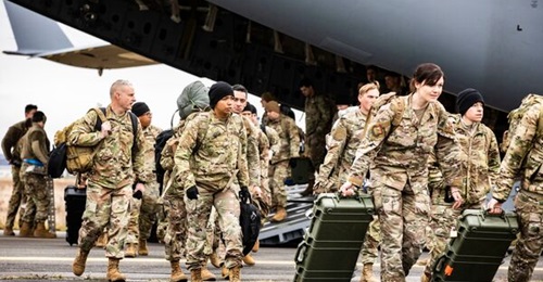 Soldiers of the US XVIII Airborne Corps arriving in Wiesbaden, Germany, on 4 February.