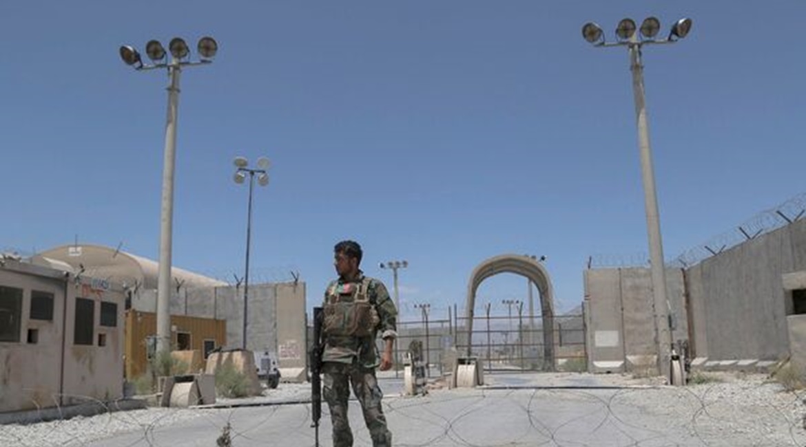 An Afghan National Army soldier stands guard at Bagram Airbase on 2 July after all US and NATO troops left and handed over the base to the ANDSF.
