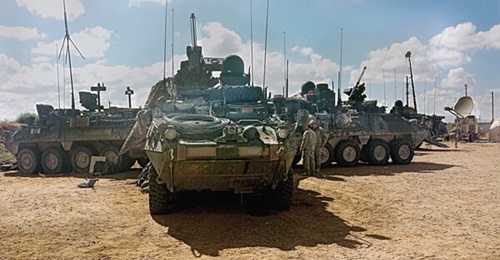 US Army Stryker vehicles equipped with mobile, high-bandwidth satellite connectivity WIN-T Inc 2 networked systems.