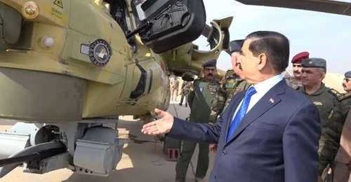 Iraqi Minister of Defence Juma Anad Sadoun inspects a Mi-28NE at Taji Air Base.