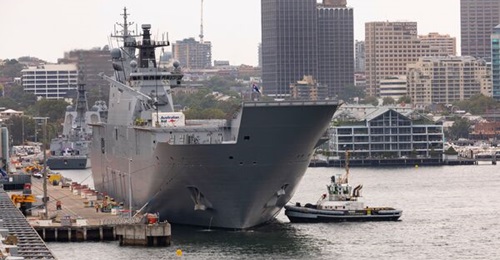 HMAS 
        
        , seen here while it was departing Sydney in support of disaster relief efforts in Tonga in January 2022.