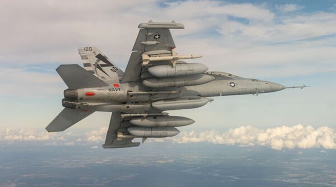 An EA-18G Growler from Air Test and Evaluation Squadron 23, located at NAS Patuxent River, Maryland, conducts a NGJ-MB flight test over southern Maryland. The AN/ALQ-249(V)1 NGJ-MB will provide the EA-18G Growler with the ability to effectively engage ...