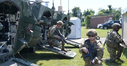 US Army soldiers emerge from Stryker vehicles during an ITN demo at Aberdeen Proving Ground, Maryland, on 30 June.