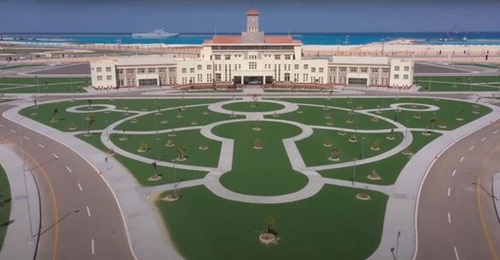 A still from a video released by the Egyptian Ministry of Defence shows the HQ building at the 3 July Naval Base with a Mistral in the background.