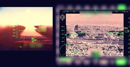 A screenshot of a Russian MoD video of a Ka-52 targeting system, showing the helicopter firing rockets indirectly into the air rather than directly at the target as would normally be expected.