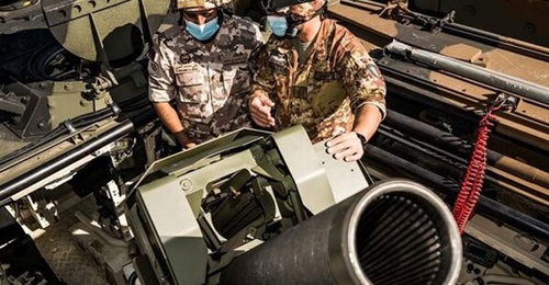 The 120 mm 2R2M mortar showing its loading tray to the rear of the 120 mm rifled mortar barrel