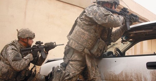 US Army soldiers engage in a firefight in Mosul, Iraq.