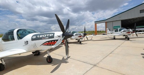 Kenya's Grob G 120TP trainers at the new Aviation Centre of Excellence.