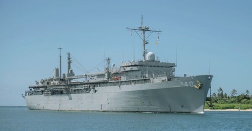 Submarine tender USS 
        
         (AS 40) arrives at Apra Harbor in Guam.The AS(X) programme is intended to deliver two new submarine tenders to replace 
        
        and USS 
        
        .
