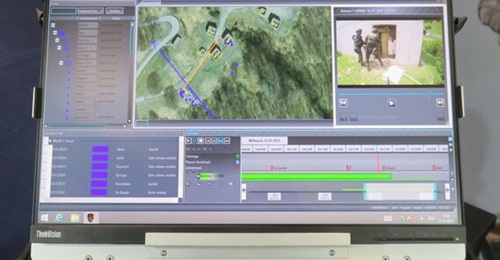 The RUAG Senator NG displayed at IT²EC in its single transit case. Note the timeline (bottom right), the video recording (top right), and the live situation display showing individual tracked personnel.