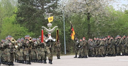 Germany stood up Heimatschutzregiment 1, its first territorial defence regiment, on 30 April, to the musical accompaniment of the mountain troops' music corps.