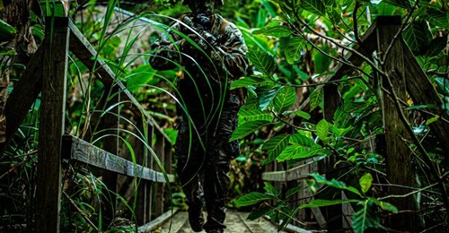 A US Marine with the 3rd Marine Division participates in a squad attack phase of the 3rd Marine Division Squad Competition at the Jungle Warfare Training Center at Camp Gonsalves, Okinawa, Japan, in January 2022. The service has rolled out an updated F...