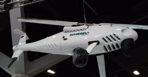 A mock-up of the S-100 Camcopter, seen at Indo Pacific 2022 with the PT-8N Oceanwatch sensor (forward) and the MX-10 electro-optical turret.