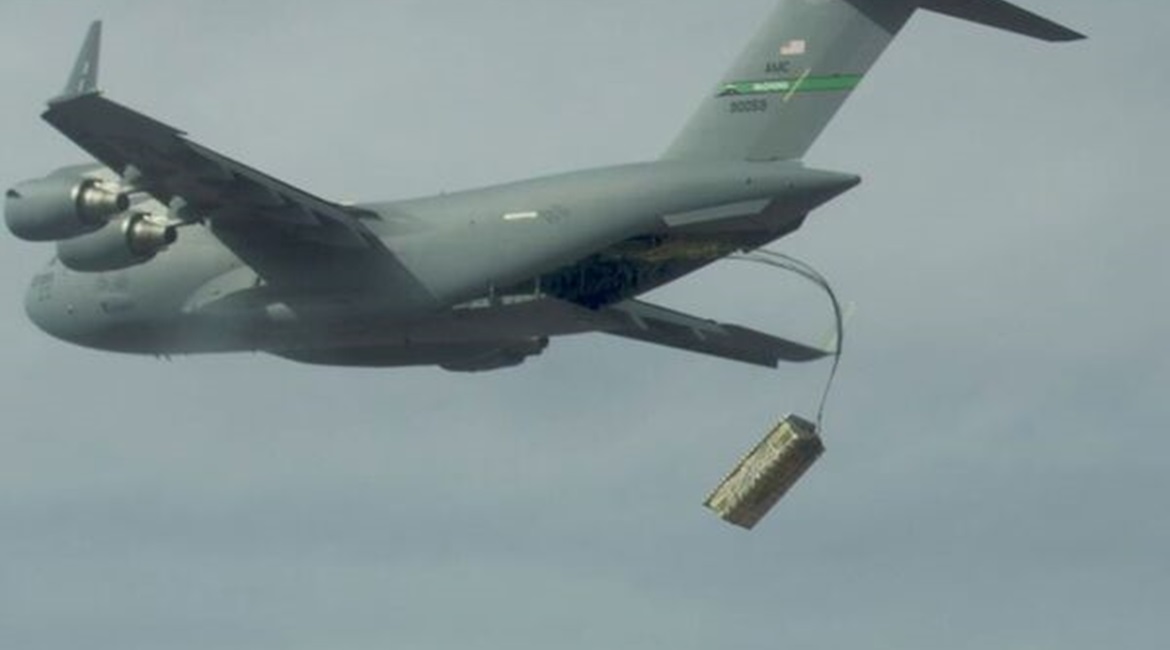 A high altitude airdrop of palletised munitions (JASSM simulants) from a C-17 using standard operational airdrop procedures is conducted during the USAF's Advanced Battle Management Family of Systems (ABMS) Onramp #2 exercise in September 2020