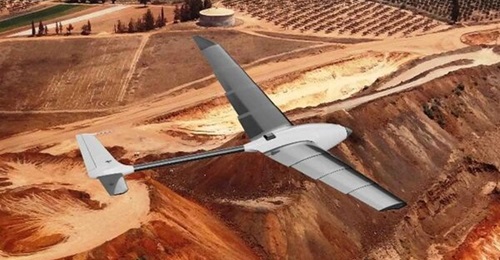 WingXpand UAV in flight with extended wings and conventional tail.