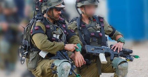 Israeli soldiers wearing 'tactile sleeve' devices as part of the Edge of Tomorrow programme that is focused on improving the performance of infantry at the platoon level.