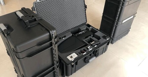 The Dronaam C-UAS is pictured in ruggedised transportable cases.