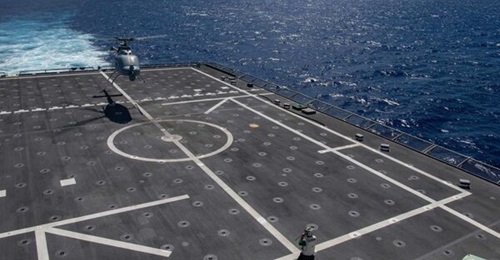 A Northrop Grumman MQ-8C lands aboard USS 
        
         (LCS 6) as part of its deployment to INDOPACOM.