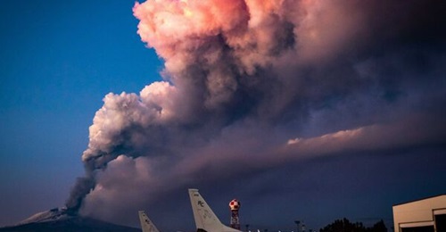 Two USN P-8As are pictured in the shadow of Mount Etna, Sicily, at Naval Air Station Sigonella. The VP (Patrol Squadron) 46, to which these aircraft were assigned, was deployed to Sigonella in early 2021.