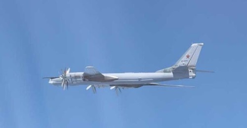 A Tu-95 bomber of the Russian Air Force flies over the Sea of Japan on 24 May 2022.
