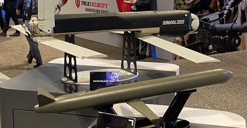 A not-to-scale model of the Jackal concept (foreground) was unveiled at the 2022 Special Operations Forces Industry Conference (SOFIC) in Tampa, Florida, 16-19 May. In the background is the Switchblade 600L tactical weapon system, which is being used a...