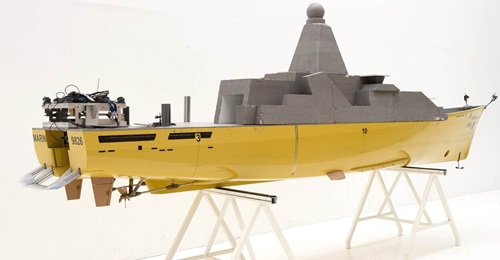 The performance of the hull vane (visible projecting from the stern of the model) was tested at the MARIN model basin facility.