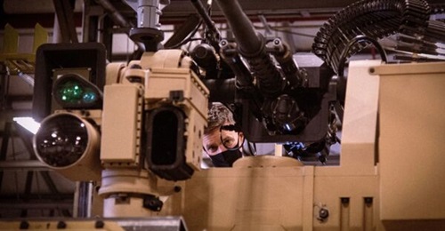 A US marine looks over the MADIS Increment 1 engineering development model aboard a Joint Light Tactical Vehicle during a February 2022 visit to the Naval Information Warfare Center Atlantic in Charleston, South Carolina. The US Marine Corps wants to f...
