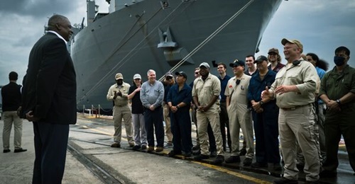 US Secretary of Defense Lloyd Austin speaks with civilians assigned to USNS 
        
         (T-AKE-7) at Sembawang Naval Base in Singapore. Austin was in Singapore to participate in the 19th Shangri-La Dialogue.