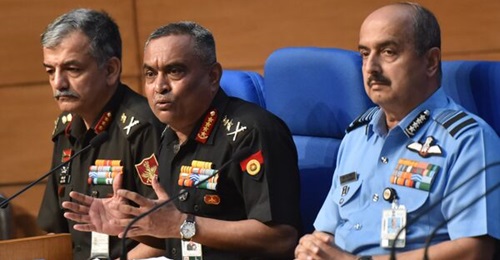 Indian Army Chief General Manoj Pande (centre), Indian Air Force Chief Air Chief Marshal Vivek Ram Chaudhari (right), and Lieutenant General Anil Puri of the Department of Military Affairs (DMA) announce India's new military recruitment policy on 14 Ju...