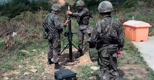 A screengrab from footage provided by DAPA showing soldiers using South Korea's upgraded 81 mm mortar system.