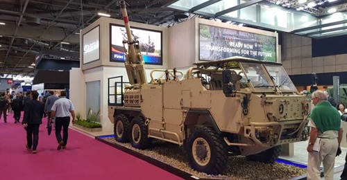 A Supacat High Mobility Transporter Extenda Mk 2 with a 105 mm gun on display at Eurosatory 2022.