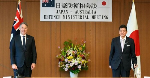 Australian Defence Minister Richard Marles and his Japanese counterpart Nobuo Kishi pose for a photo before their Japan-Australia bilateral defence meeting at the Japanese Ministry of Defense in Tokyo on June 15, 2022.
