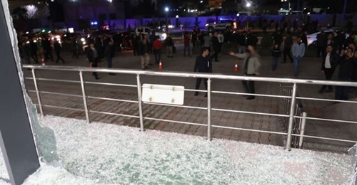The view through a broken window after two rockets, claimed to have been fired by Iranian-backed Shia militias, landed inside Erbil International Airport, near a US forces military base.