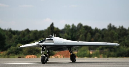 An image of the first SWiFT UCAV subscale prototype, which is a tailless design. The aircraft's electro-optical/infrared system is above the engine intake. A conformal antenna is also seen at the rear of the fuselage. The second prototype, with a tailf...