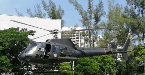 A Brazilian Fennec AvEx helicopter of the 1st Army Aviation Battalion equipped with an HMP250 pod armed with an M3P gun and the LM70/7 rocket launcher.