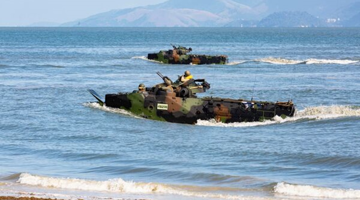 The US Marine Corps AAV7 amphibious assault vehicles conduct ship-to-shore operations during a simulated disaster relief situation during UNITAS LX at Ilha da Marambia, Brazil in August 2019. US Army Lieutenant General Laura Richardson has vowed to con...