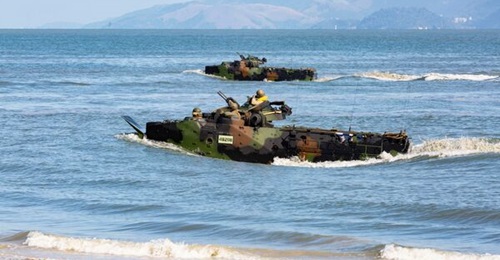 The US Marine Corps AAV7 amphibious assault vehicles conduct ship-to-shore operations during a simulated disaster relief situation during UNITAS LX at Ilha da Marambia, Brazil in August 2019. US Army Lieutenant General Laura Richardson has vowed to con...