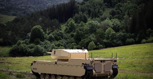 Milrem's Type-X robotic combat vehicle pictured integrated with Kongsberg's Protector RT40 turret during live-fire testing in Slovenia, June 2022. The Type-X robotic combat vehicle is being touted as a model for the EU's UGV development after the concl...