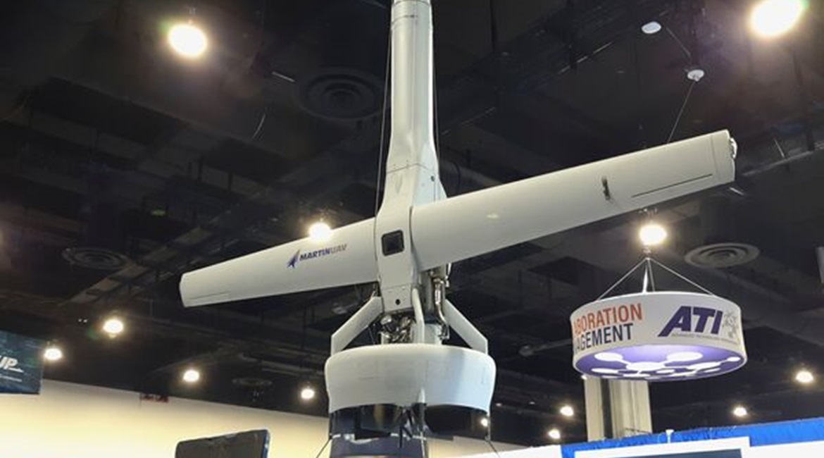 The Martin UAV V-Bat 128 vertical take-off and landing (VTOL) tail-sitting fixed-wing unmanned aerial vehicle (UAV) on display at Navy League's 2021 Sea-Air-Space exposition on 3 August 2021. The USMC awarded Martin UAV a contract to develop a...