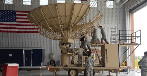 US airmen assemble a SATCOM Earth Terminal Subsystem (SETSS).
