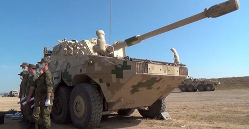 A screengrab from footage released by the MoD in Moscow on 3 August showing Russian troops alongside a Chinese ZTL-11 fire support vehicle as part of preparations for a Sino-Russian exercise set to be held in China from 9-13 August.